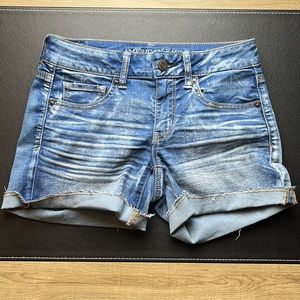 American Eagle Super Stretch Distressed Midi Shorts